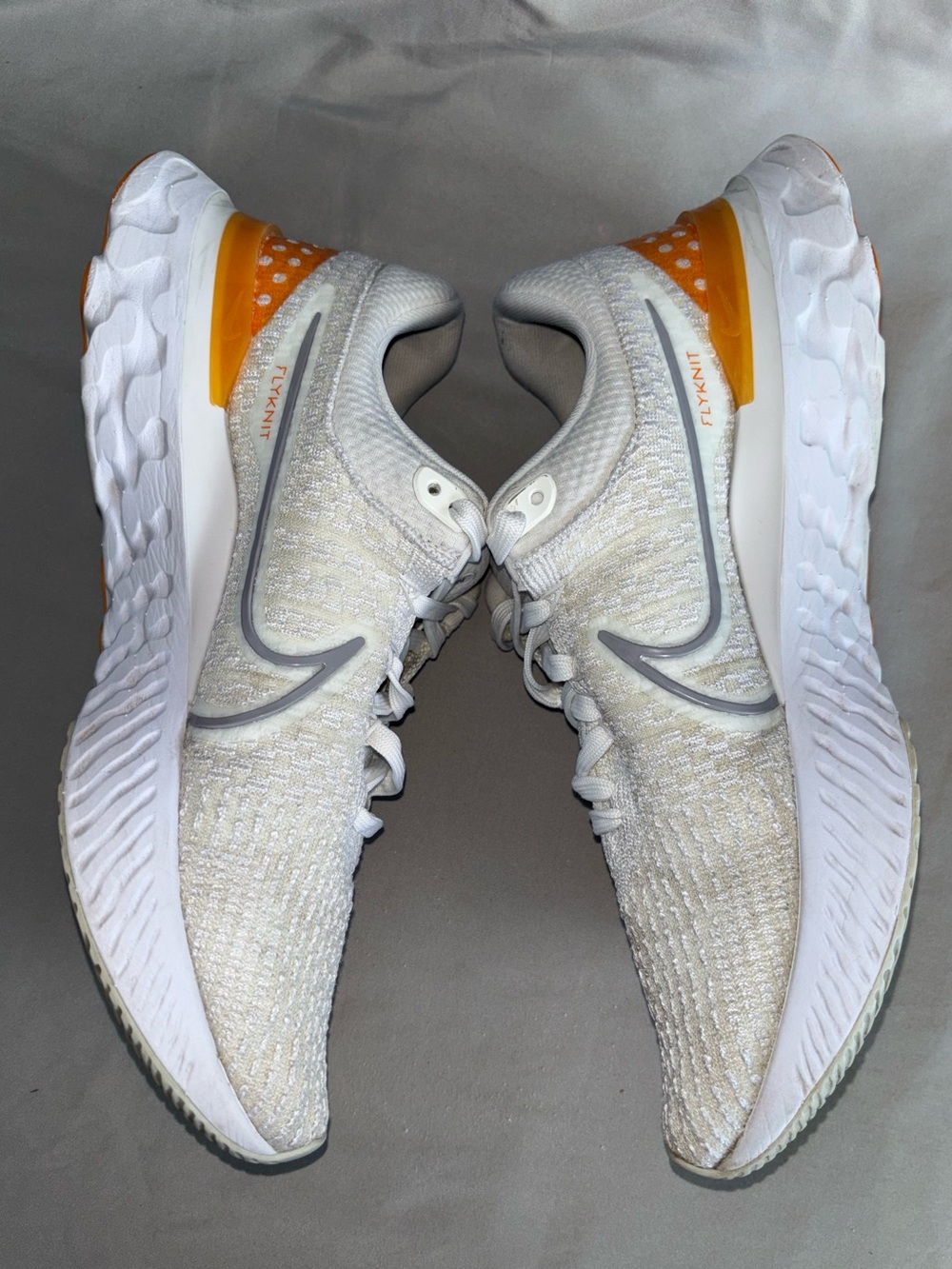 Nike Flyknit Low-Top Sneakers in White with Orange Heel Size 10